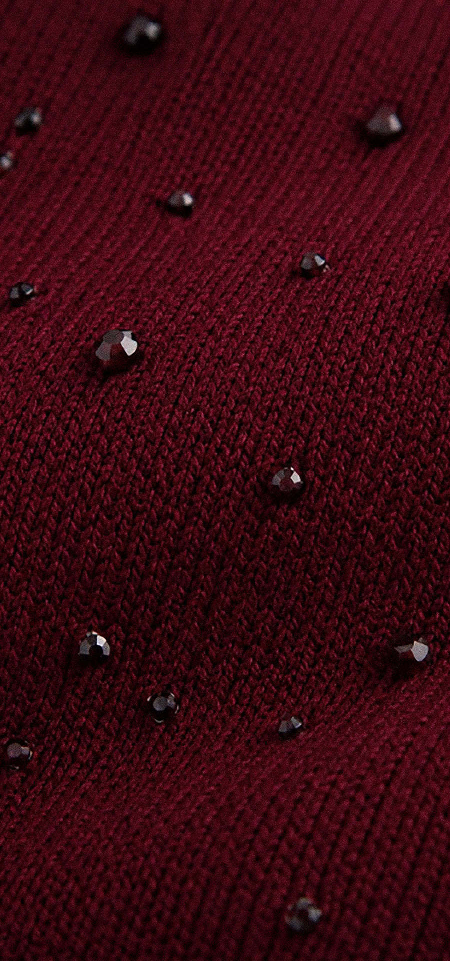 Ref. V-051 Blusa tejida manga sisa. Tono vino tinto