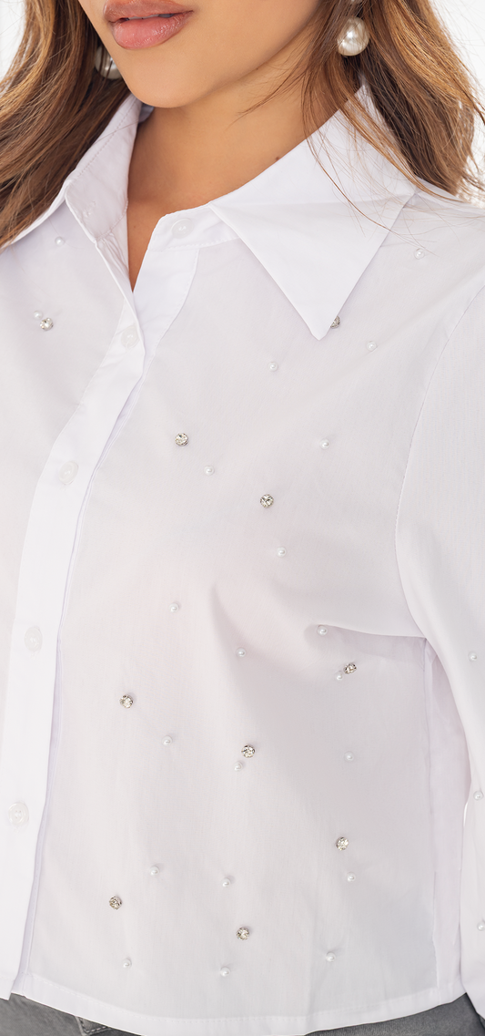 Ref. V-068 Camisa suelta manga larga. Tono blanco