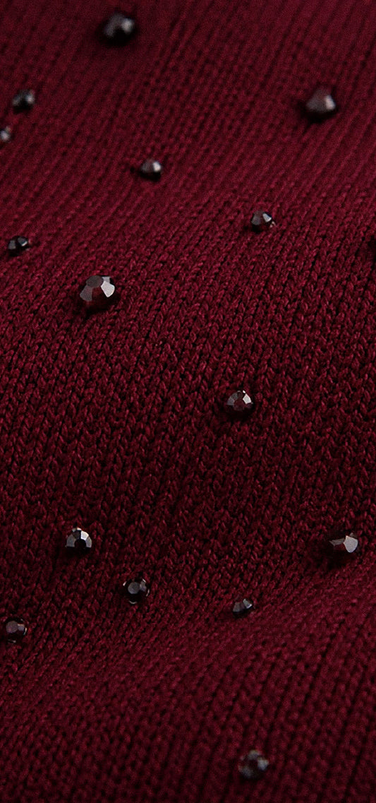 Ref. V-051 Blusa tejida manga sisa. Tono vino tinto